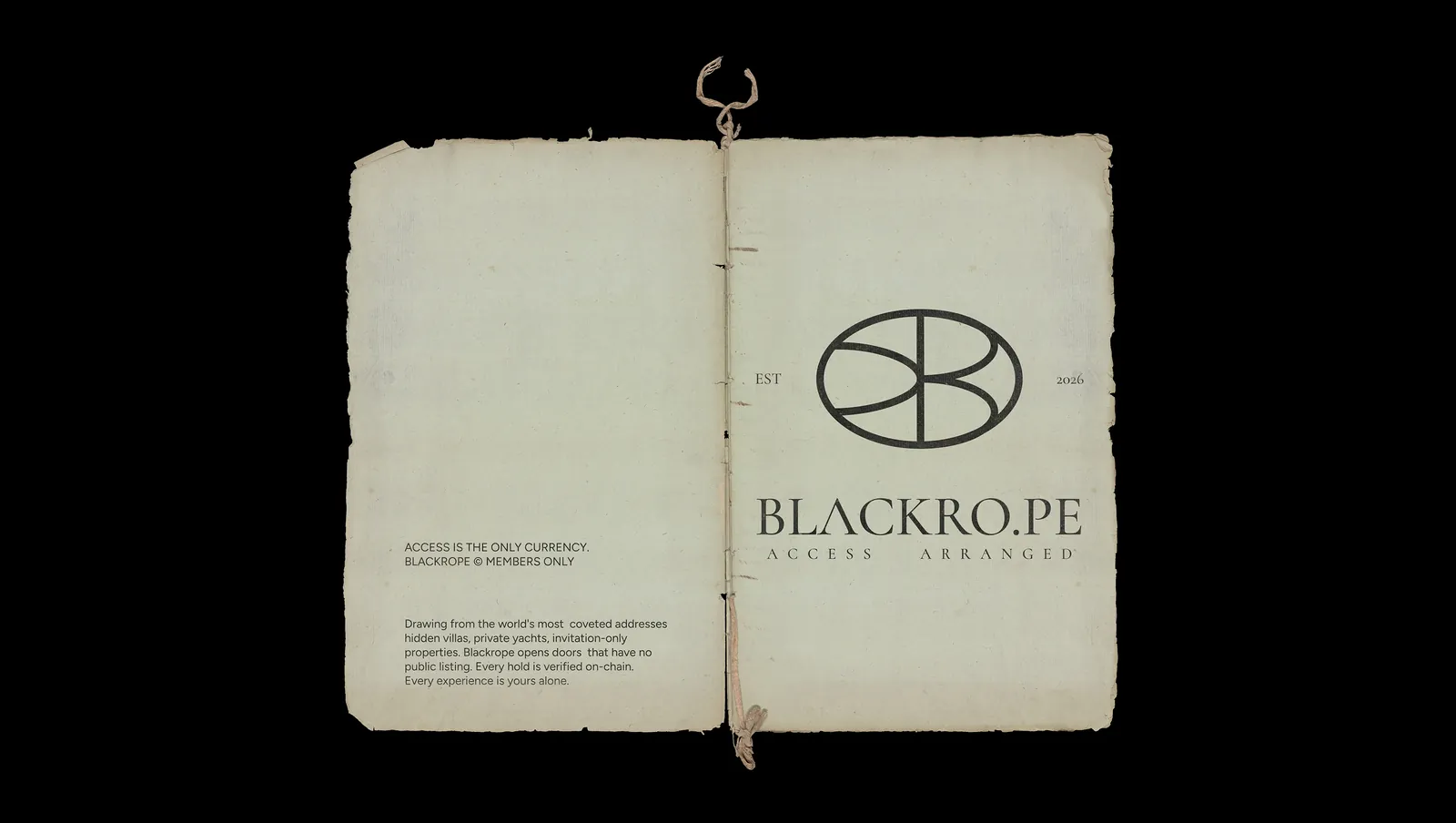 An open hand bound book, the oval monogram and the line "Access arranged" printed across the spread.