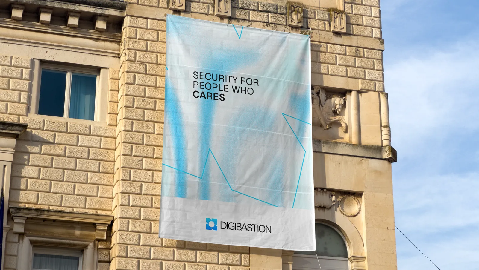 A Digibastion banner hung down a stone facade, reading "Security for people who cares".